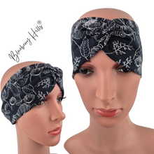 Lade das Bild in den Galerie-Viewer, Haarband "Svartlin" mit Knoten Blumen Jersey schwarz