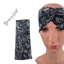 Lade das Bild in den Galerie-Viewer, Haarband "Svartlin" mit Knoten Blumen Jersey schwarz