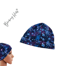 Lade das Bild in den Galerie-Viewer, Beanie &quot;Blue Meadow&quot; für Damen aus blauem Jersey mit Naturmotiv

